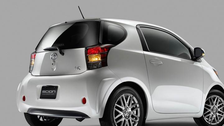 Side Back Pose Of 2011 Scion iQ In White